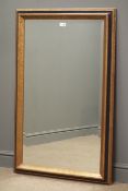 Rectangular bevel edged mirror in black lacquered and gilt frame, W71cm,