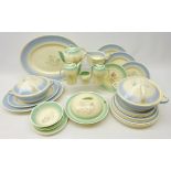 Susie Cooper Feather pattern dinner ware with green and blue borders,