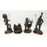 Four Juliana Collection bronzed figures depicting Native Americans,