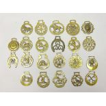 Collection of various Horse Brasses including Clock, Anchor, Maltese Cross,