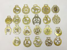 Collection of various Horse Brasses including Clock, Anchor, Maltese Cross,