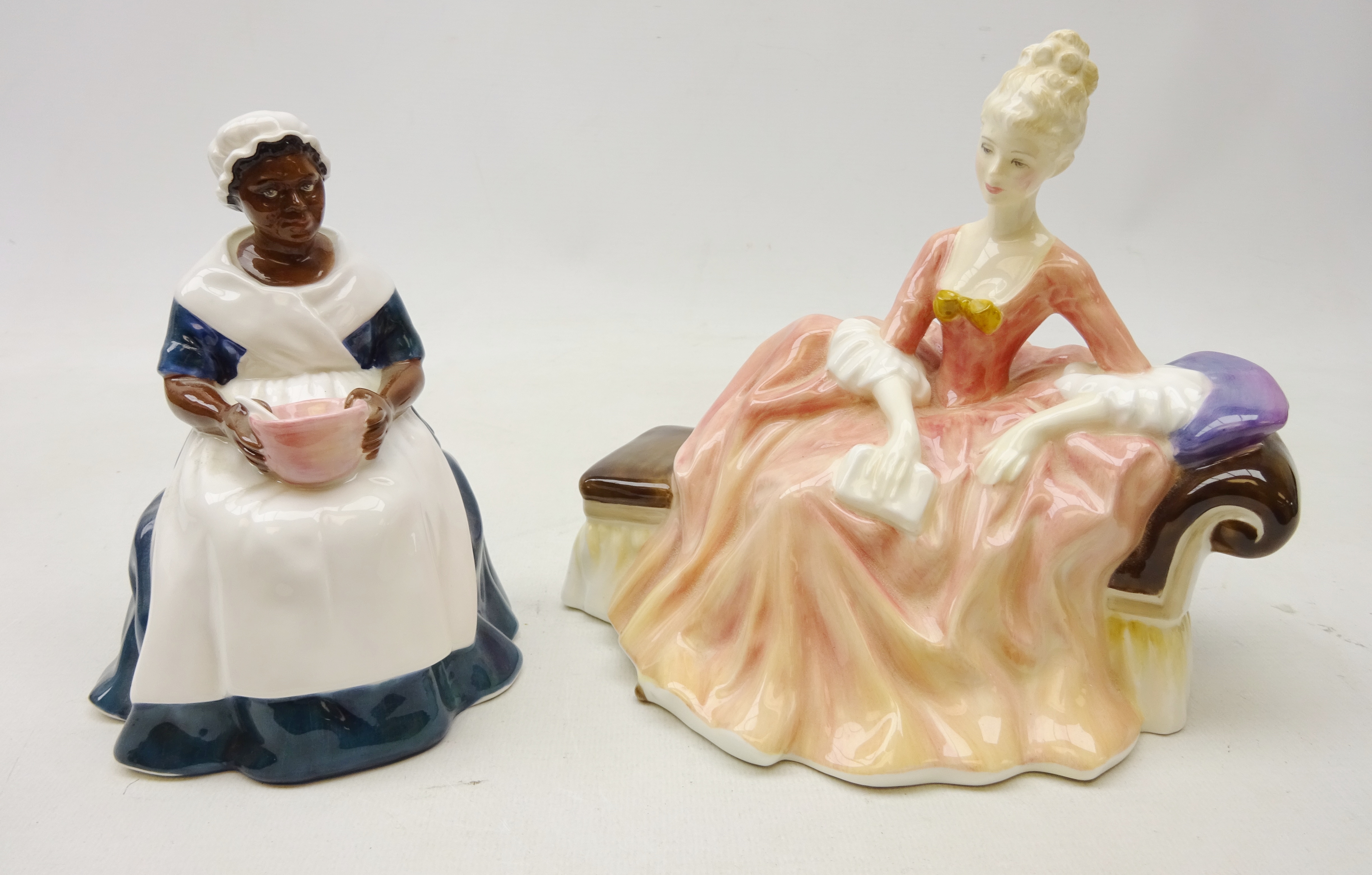 Two Royal Doulton figures comprising 'Royal Governor's Cook' HN2233 and 'Reverie' HN2306 (2)