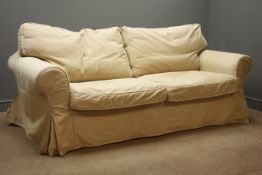Ikea two seat Ektorp sofa bed, upholstered in beige fabric, plus full set of spare covers in cream.