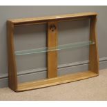 Ercol wall rack, centre support with carved and pierced swan, single glass shelf, W92cm, H62cm,