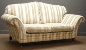 Duresta two seat sofa upholstered in chenille stripe cover, mahogany finish supports,