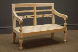 Child's bench, carved and pierced back supports, reeded arm rests, turned and fluted supports,