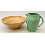 Susie Cooper green glaze jug with incised squirrel design, H16cm and pink glaze jug,