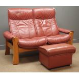 Stressless two seat reclining sofa, (W144cm) and storage stool,