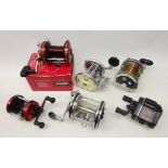 Six fishing reels including; Abu Garcia 'Ambassadeur 6000', Silstar 'Starlite II',