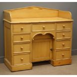 Victorian pine knee hole dressing table, raised shaped back, four short,