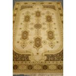 Louis De Poortere Mossoul Persian style green ground rug, central medallion,