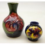 Moorcroft vase of bottle shaped form tube lined in the 'Hibiscus' pattern H9cm and a Moorcroft