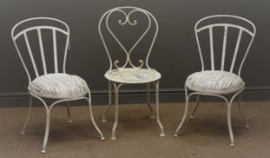 Three French wrought metal garden chairs,