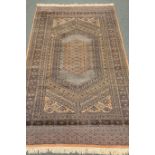 Persian Bokhara blue ground rug, 250cm x 150cm Condition Report <a href='//www.