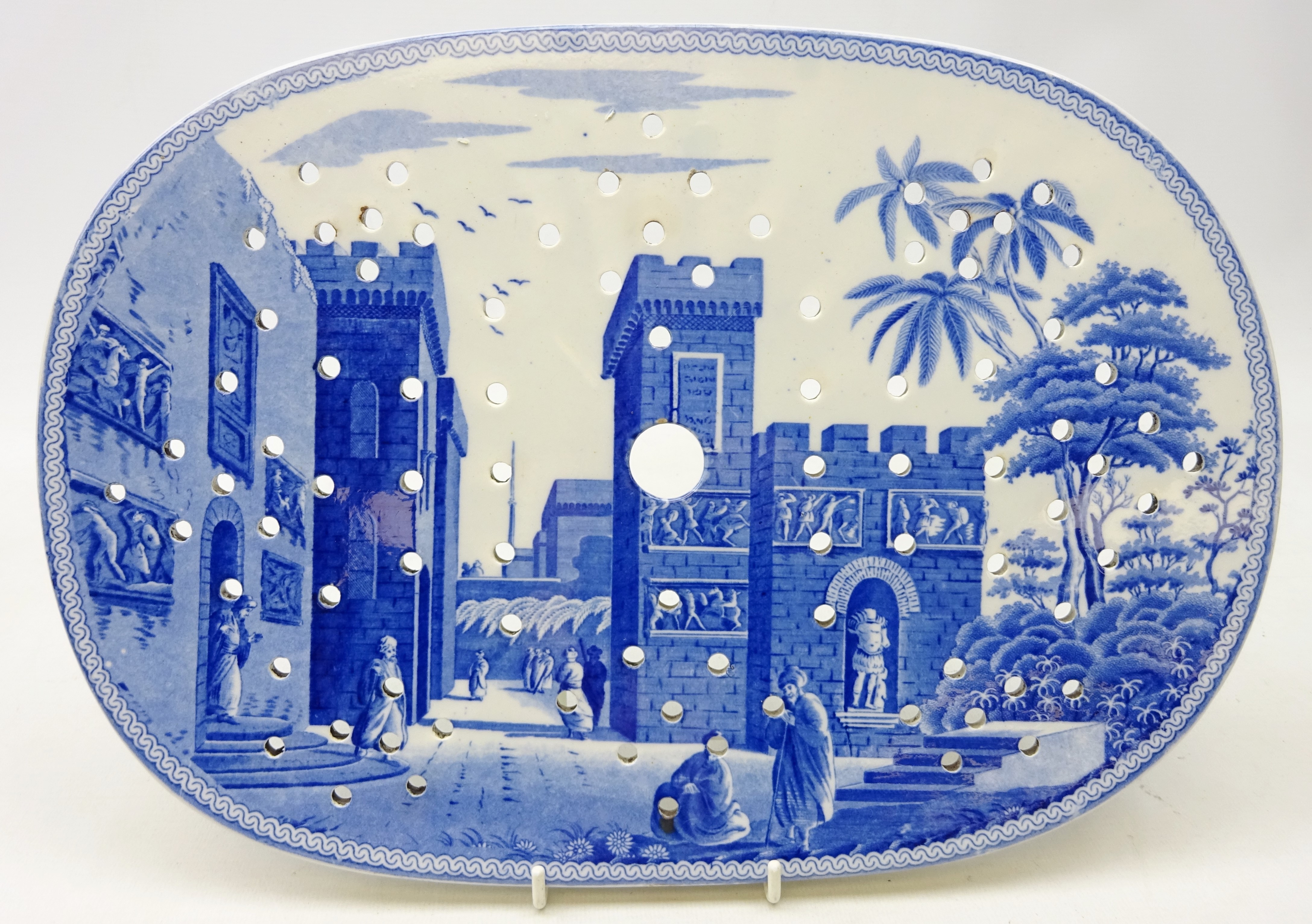 Early 19th century Spode blue and white drainer in the 'The Castle of Boudron' pattern from the