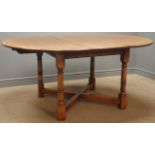 Reproduction oak extending dining table, with additional leaf,