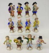 Set of eleven Sitzendorf porcelain monkey band figures and Capodimonte conductor,