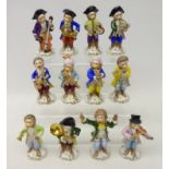 Set of eleven Sitzendorf porcelain monkey band figures and Capodimonte conductor,