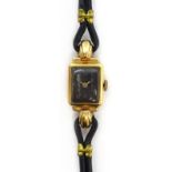 9ct gold Ladies wristwatch, hallmarked on black leather strap