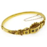 Gold diamond and sapphire set hinged bangle, stamped 15ct Condition Report Approx 10.