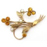 9ct gold floral bouquet brooch set with citrine and seed pearls Condition Report