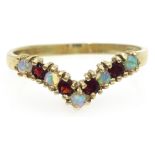 9ct gold opal and garnet wishbone ring, hallmarked Condition Report Approx 1.