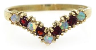 9ct gold opal and garnet wishbone ring, hallmarked Condition Report Approx 1.