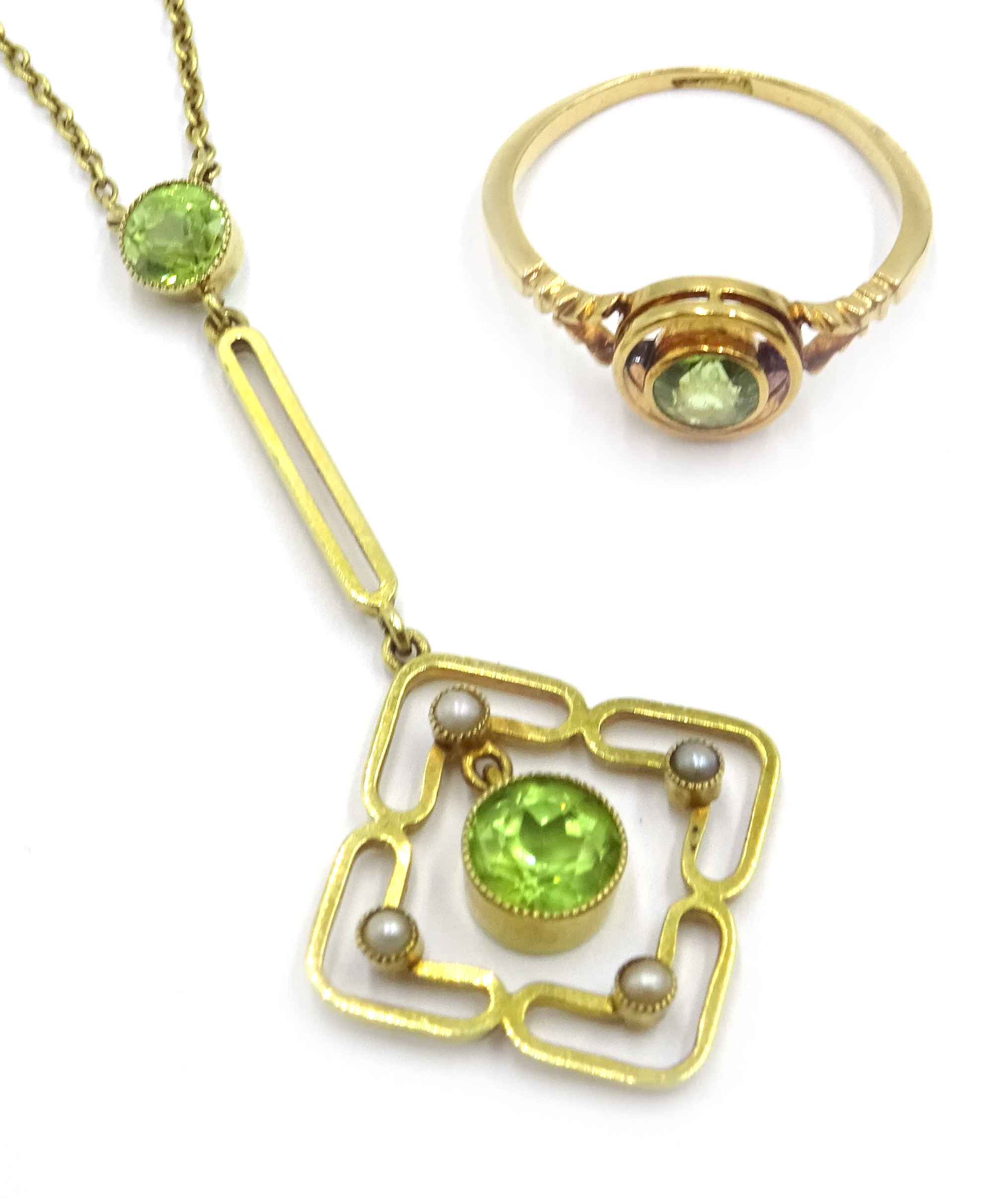 Edwardian peridot and seed pearl pendant necklace stamped 15ct and a similar rose gold ring stamped