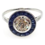 18ct white gold (tested) Art Deco style sapphire and diamond circular ring, central diamond 0.