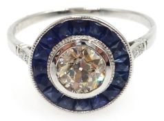 18ct white gold (tested) Art Deco style sapphire and diamond circular ring, central diamond 0.