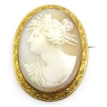 Cameo brooch in scrolled 9ct gold surround stamped 9ct 5cm Condition Report <a