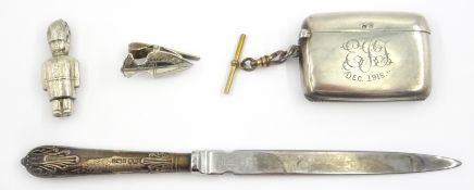 Silver vesta, napkin clip, rattle and silver handled paper knife