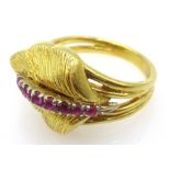 18ct gold (tested), leaf design ring, set with seven rubies, approx 6.