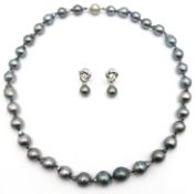 Tahitian black pearl necklace on 18ct white gold clasp hallmarked and a pair of 18ct white gold