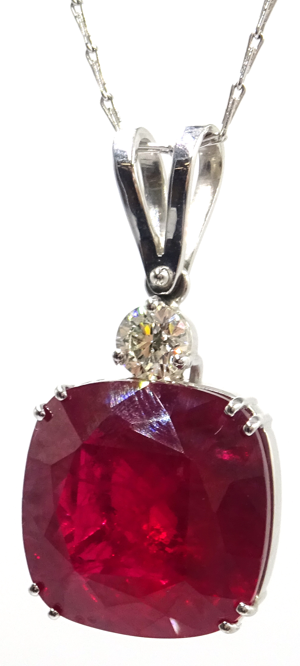 18ct white gold large cushion cut ruby and diamond pendant, stamped 750, ruby approx 28.