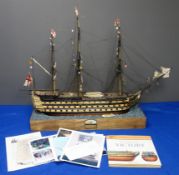 Wooden solid hull scale model of HMS Victory, furl rigged flying signal flags,