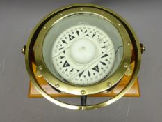 Early 20th century Marine Compass black case with white dial and brass bezel in gimball stamped