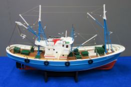 Part wooden scale kit model of the Norwegian Fishing Boat Carmen, twin-masted with single screw,