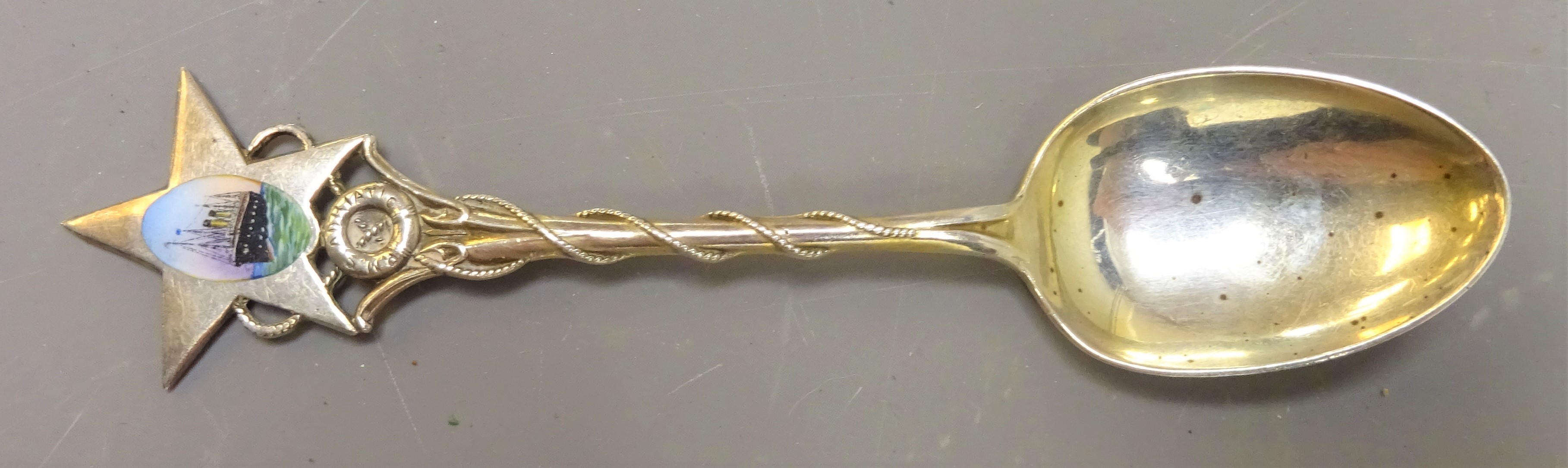 Silver spoon, enamelled with RMS Adriatic in a star, ropetwist handle, Rd.No.