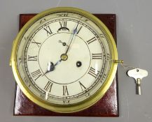 20th century brass cased Bulkhead type Clock, circular Roman dial with twin train movement,