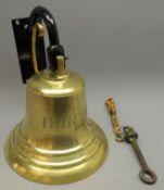 Large brass ships Bell engraved 'Burma' cast iron clapper with rope handle,