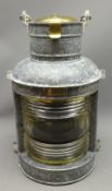Peko alloy ships lamp, brass fittings and cover, clear glass lens with swing handle,