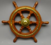 Small Simpson Lawrence brass mounted teak six-spoke ships wheel,