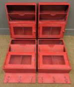 Four red finish locker style wall racks,