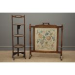 Early 20th century oak folding cake stand and an oak fire screen with floral tapestry