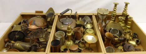 Victorian seemed copper kettle, two pairs of Victorian brass candlesticks, two copper powder flasks,