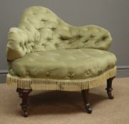 Small Victorian shaped back settee, upholstered in light green buttoned velvet,