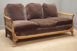 Early 20th century walnut framed three piece bergere lounge suite comprising of three seat settee