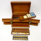 Victorian mahogany travelling games compendium with hinged cover and two swing front panels