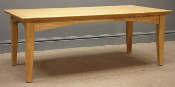 Oak coffee table, shaped rails, tapering supports, 60cm x 120cm,